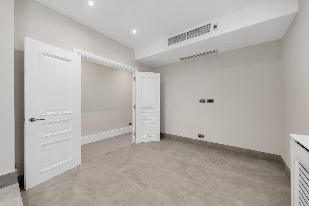 property in St Mary Abbots Court, 
Warwick Gardens, W14
