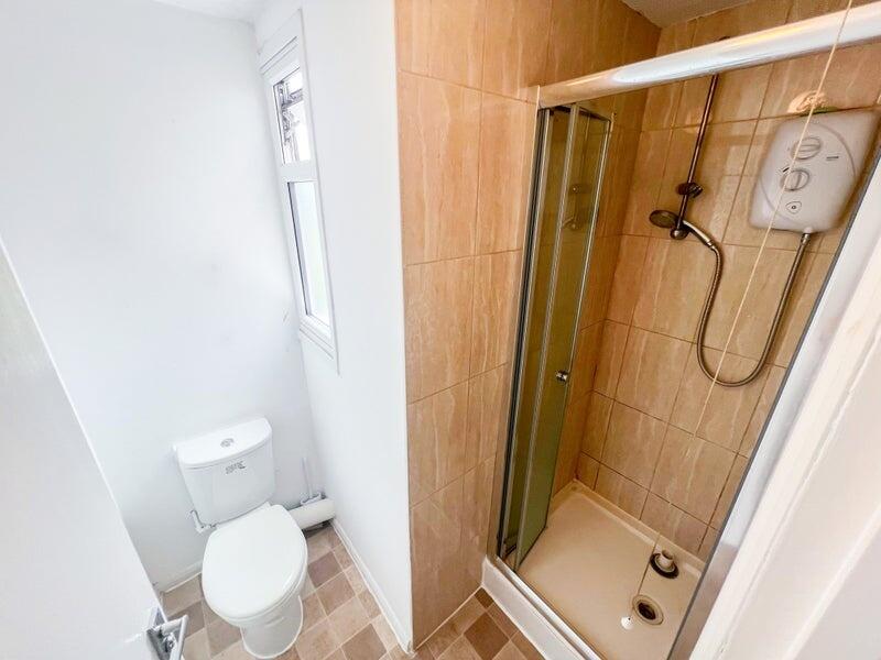 A clean and well-maintained bathroom featuring ...