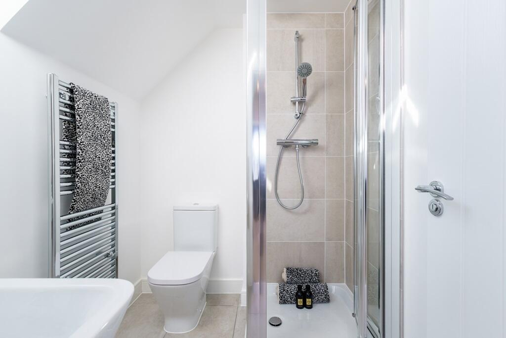 The second floor has its own shower room