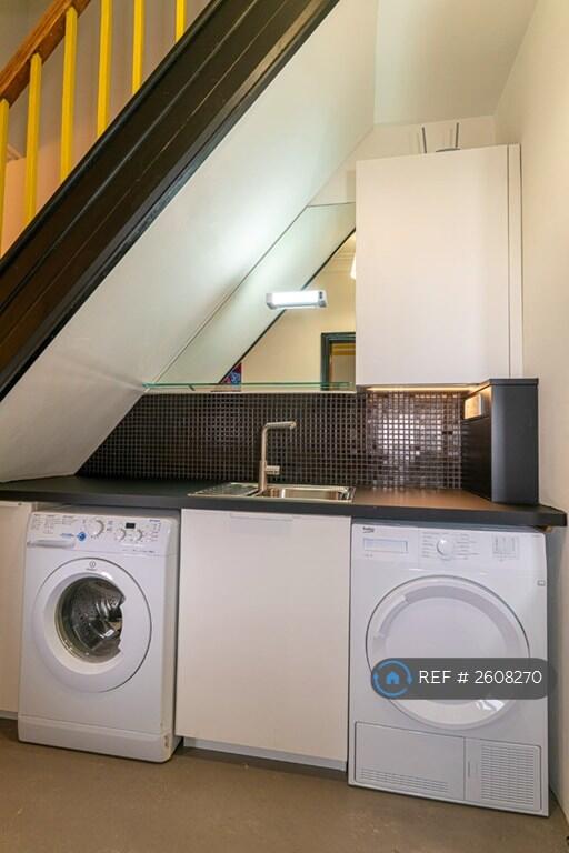 Utility With Washing Machine And Dryer.