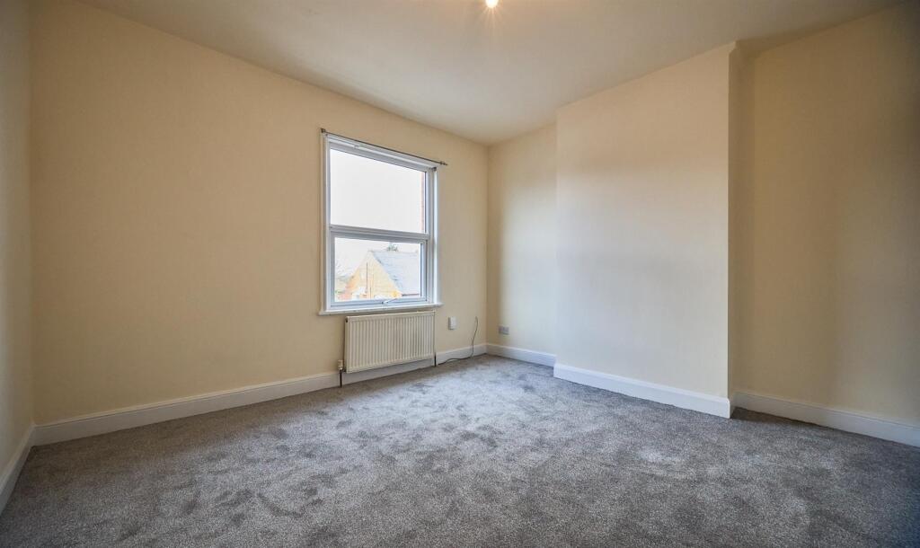 FRONT BEDROOM ONE