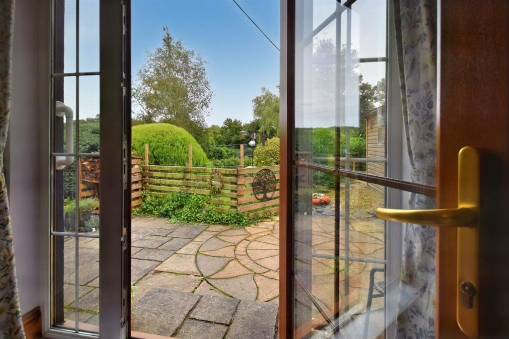 Doors to Patio from Bedroom Three