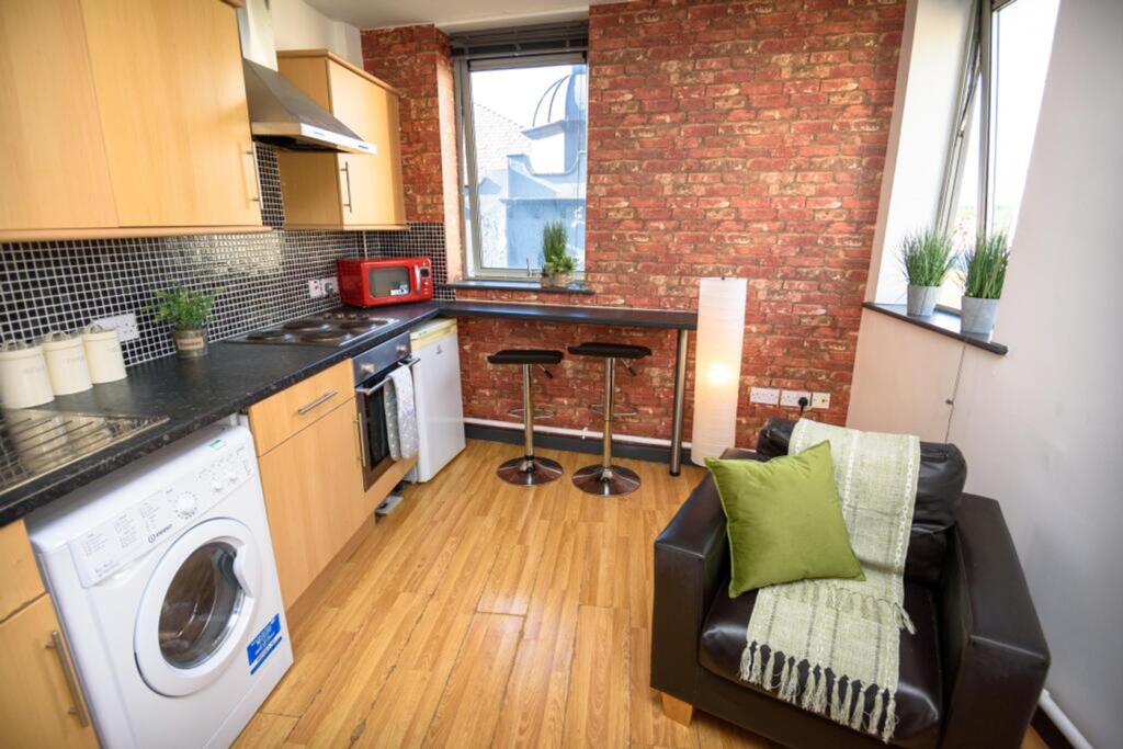 Stylish kitchen featuring modern appliances, am...