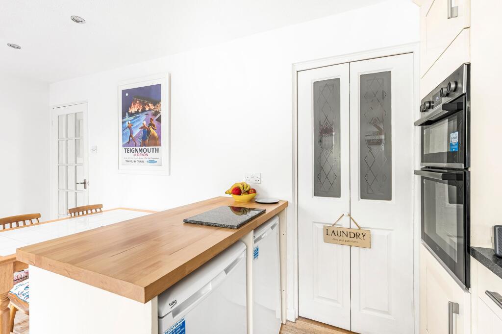 Kitchen into laundry area