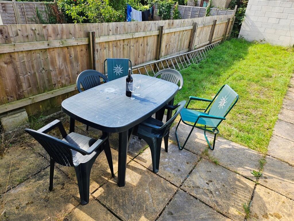 A spacious garden area perfect for outdoor gath...