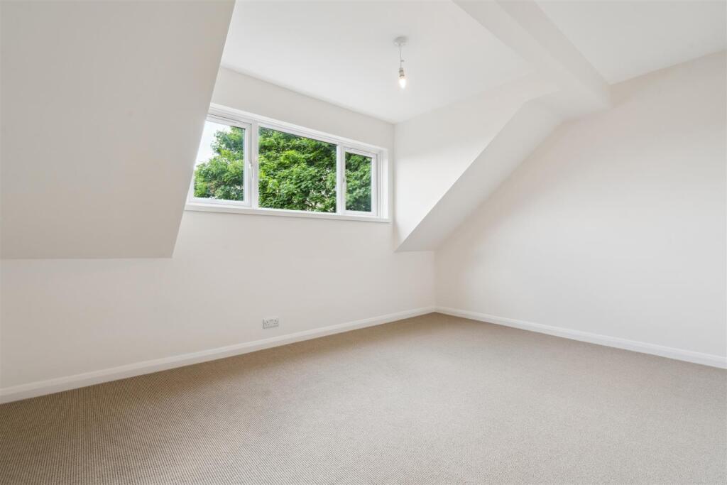 4 Landseer Close SW19 2UT bedroom 1.jpg
