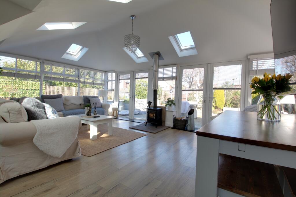 Open plan living and dining room areas