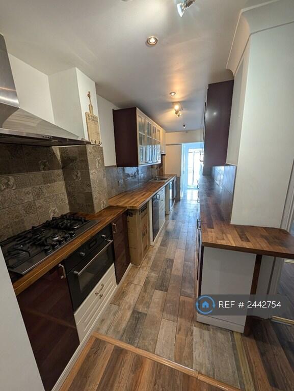 Kitchen (2x Fridge, Freezer And Dishwasher)