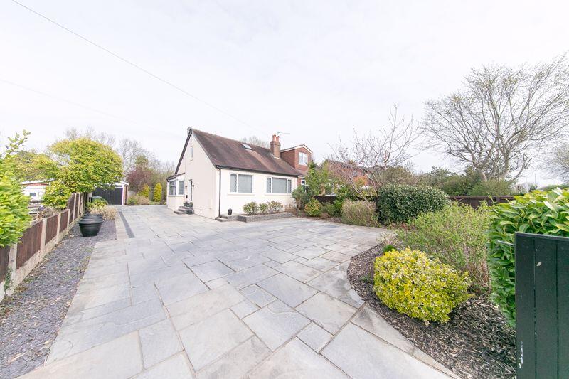 Front elevation &amp; driveway