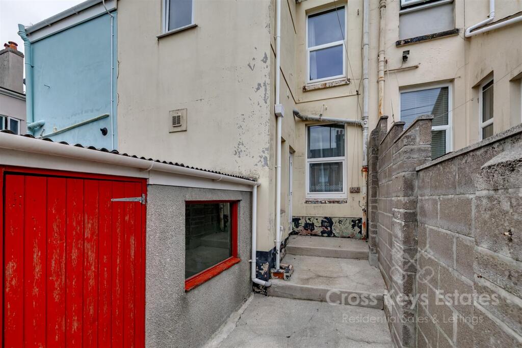 Courtyard And Garage