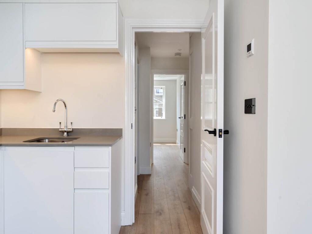 kitchen through bedr