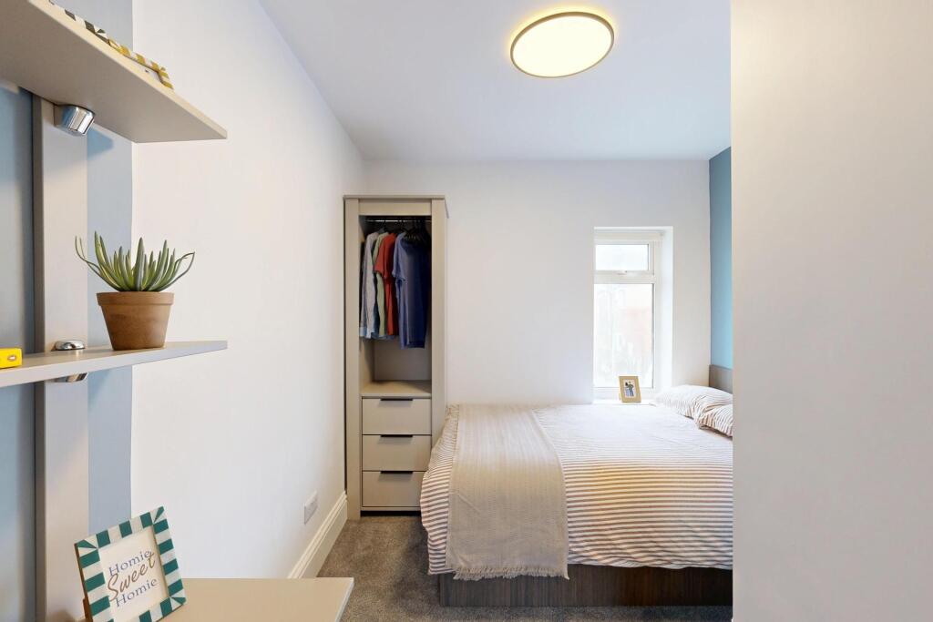 Bright and inviting master bedroom featuring a ...