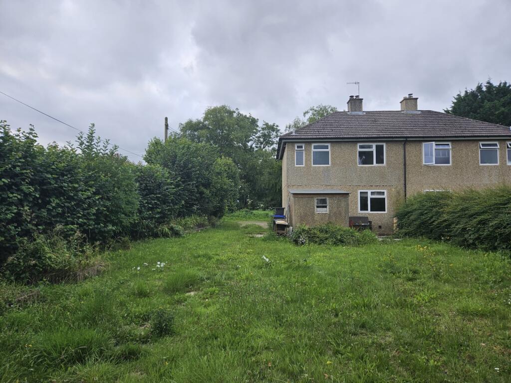 Facing down the garden