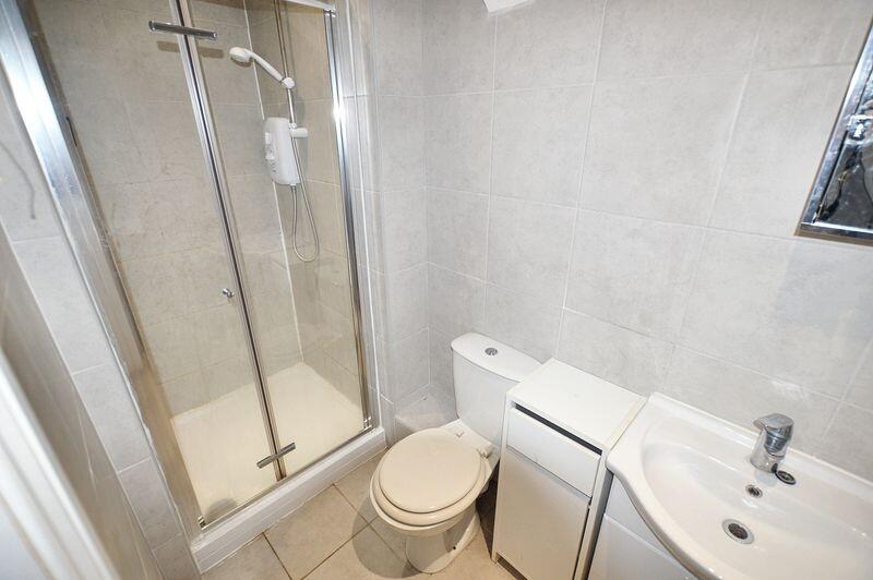 A clean and well-maintained bathroom featuring ...