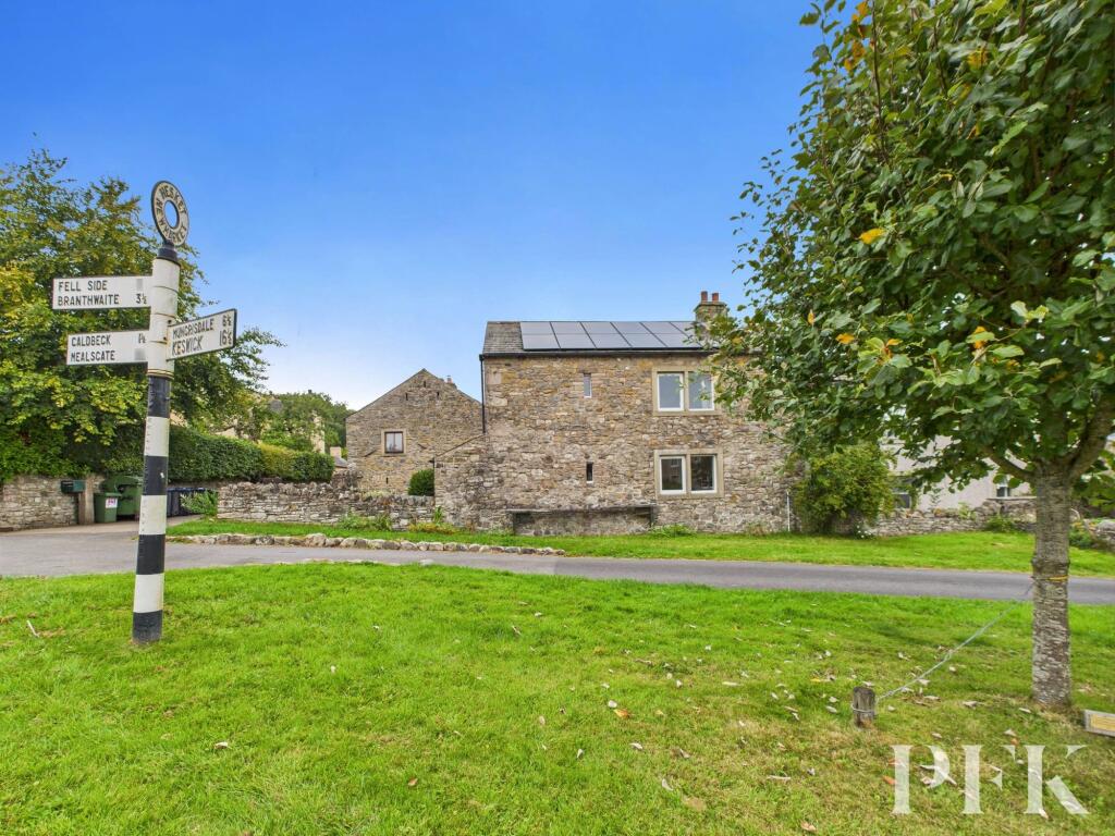Across village green toward rear of the property