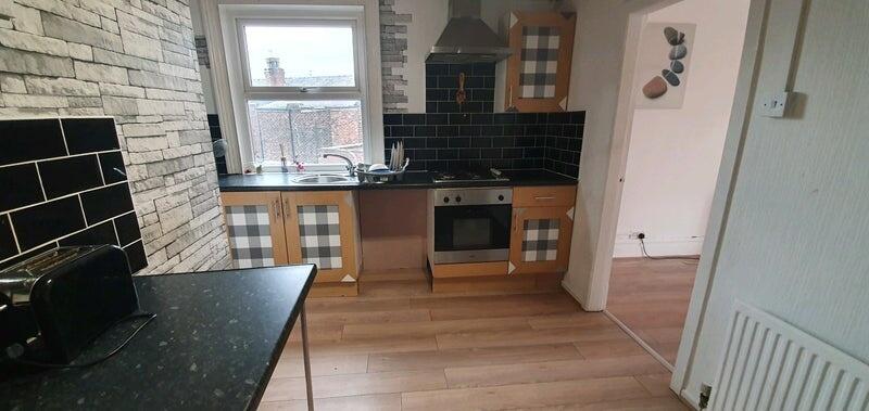 Bright and modern kitchen with natural light, f...