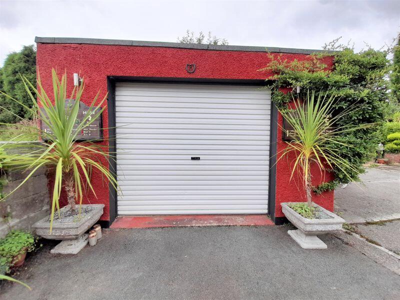 Garage with Inspection Pit and Roller...