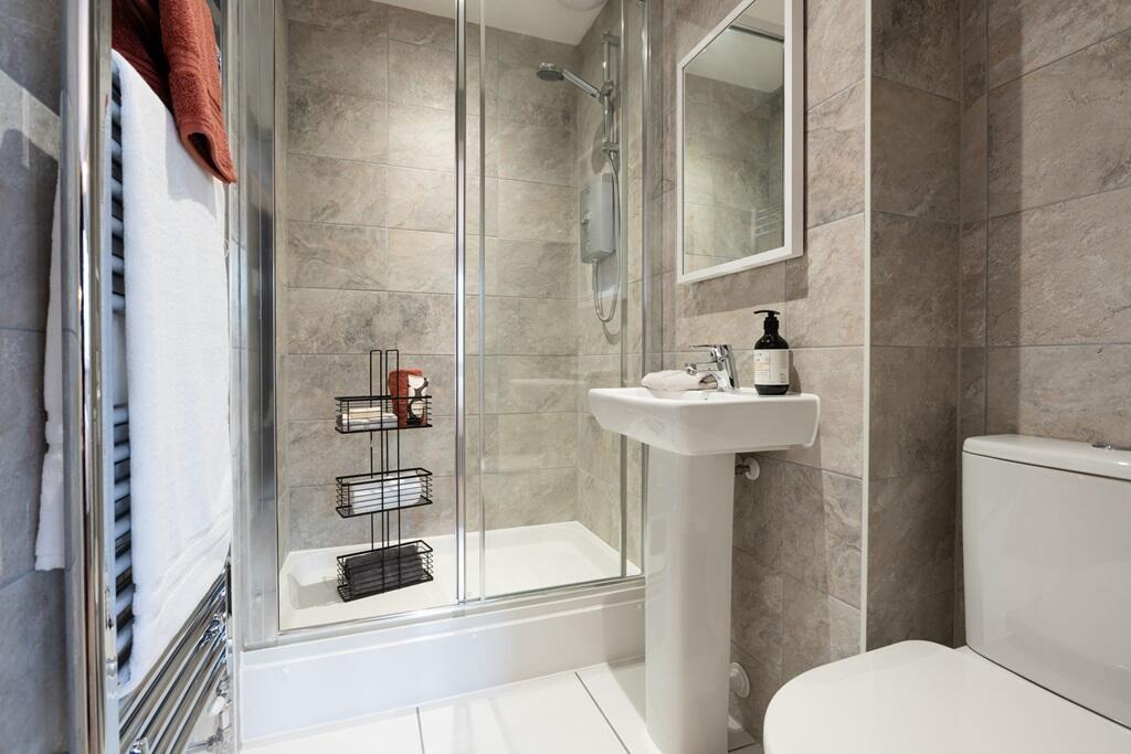 An en-suite shower room away from the family