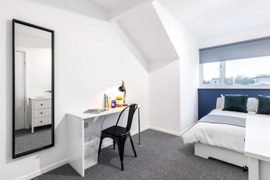 Bright, well-presented bedroom featuring a doub...