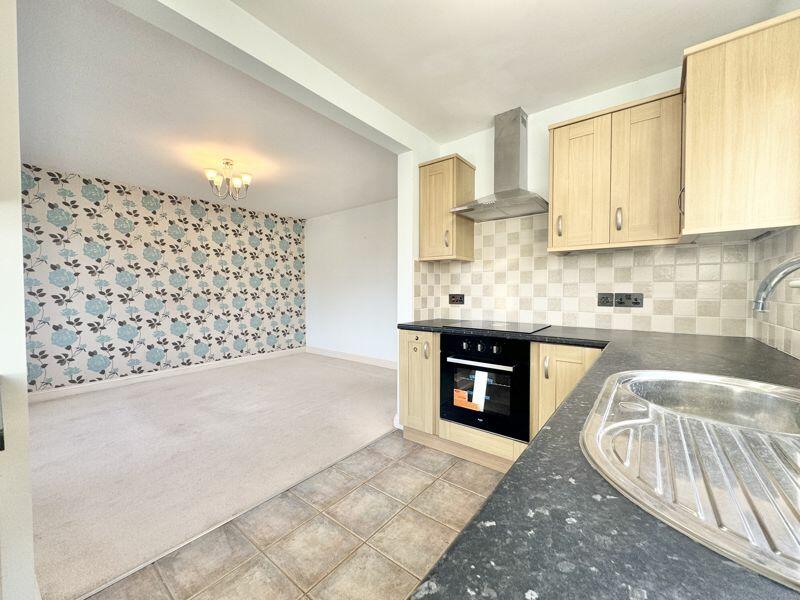 Kitchen through dining room