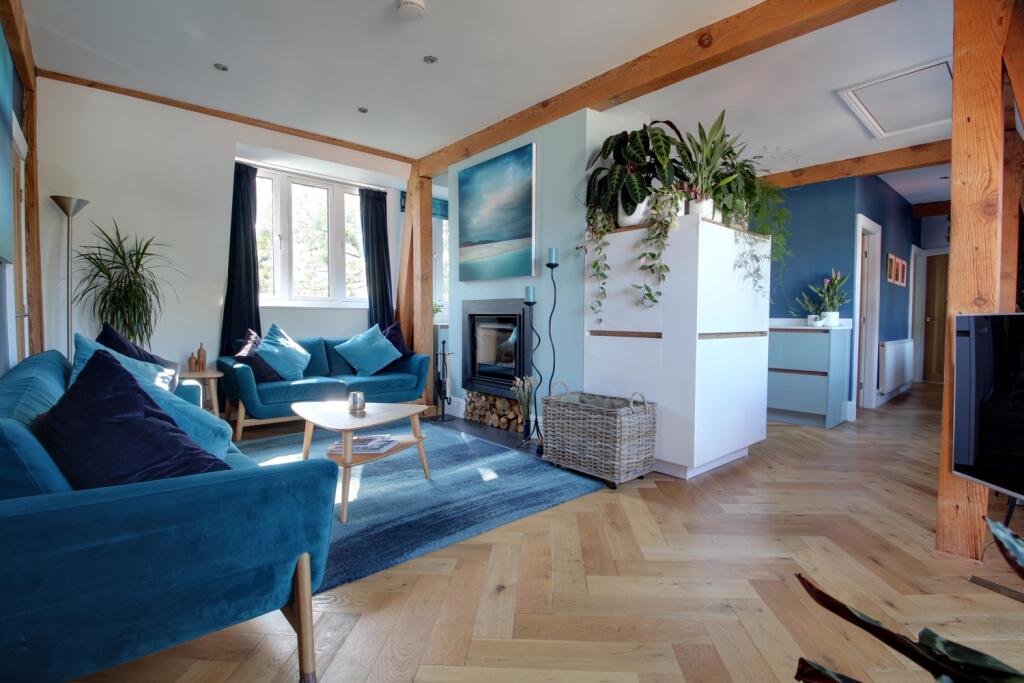 Living room with the kitchen dining and study area