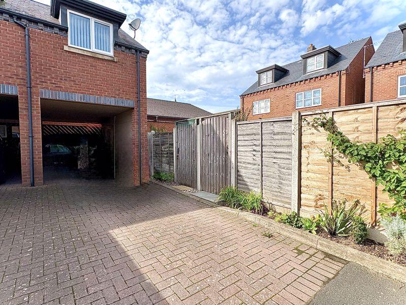 PARKING AND CARPORT TO REAR