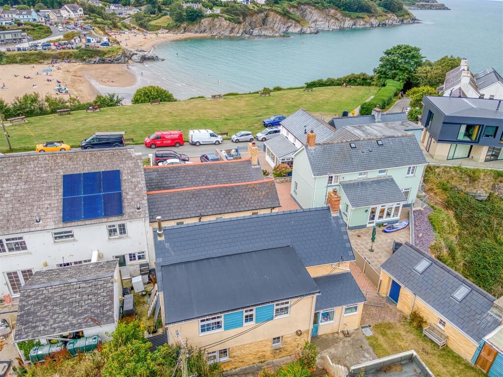 Aerial view of house and sea