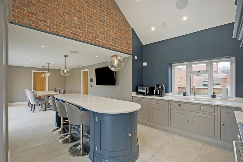 KITCHEN THROUGH TO DINING AREA