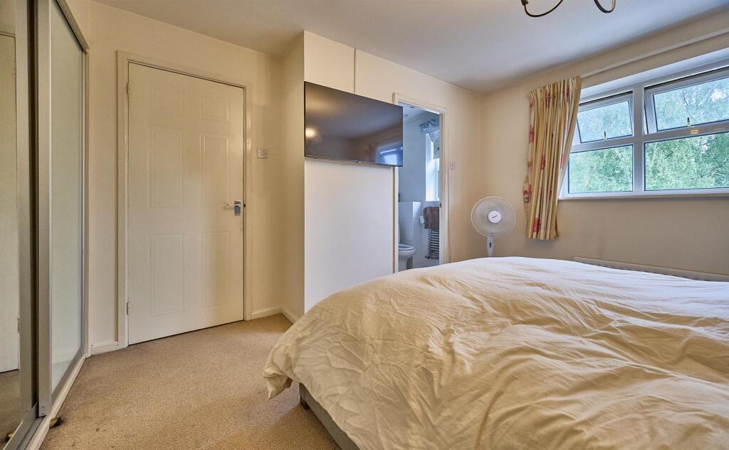 BEDROOM ONE TO FRONT