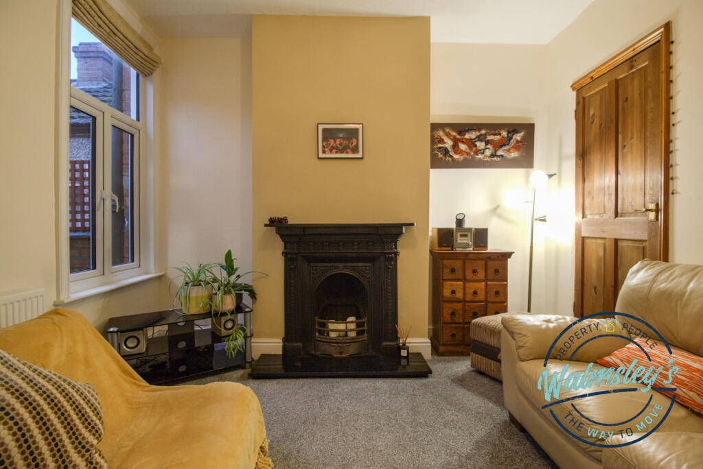 Sitting room with delightful fireplace