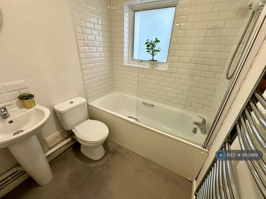 Bathroom With Shower, Bath &amp; Heated Towel Rail