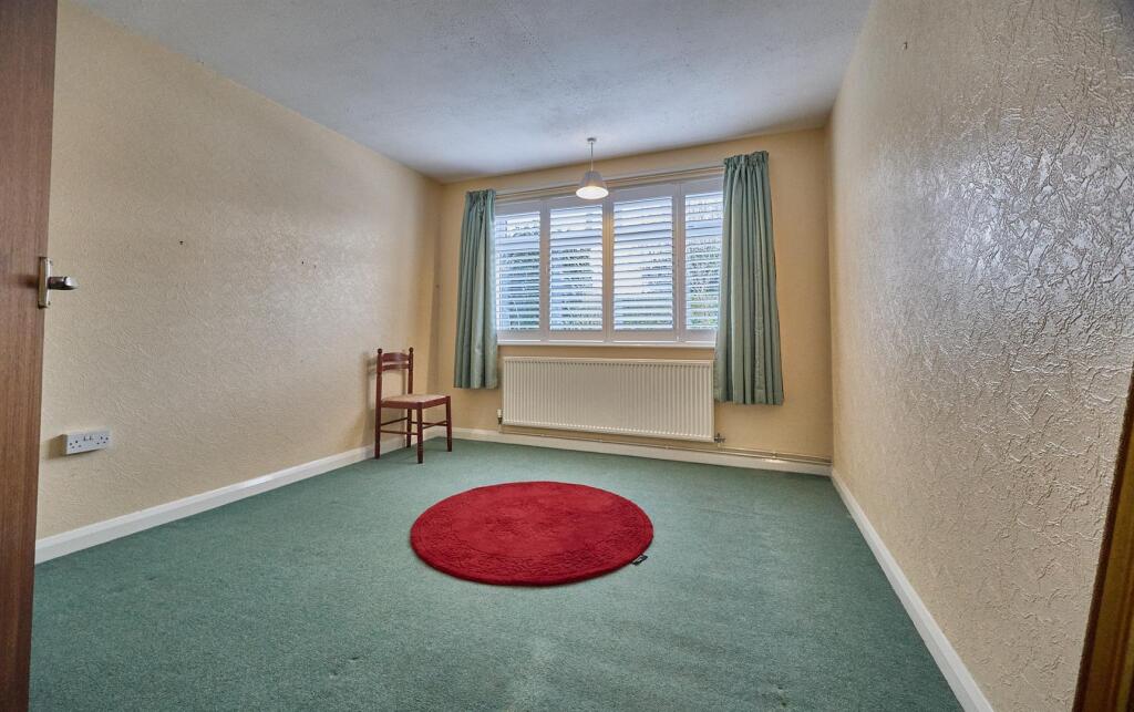 BEDROOM TWO TO FRONT