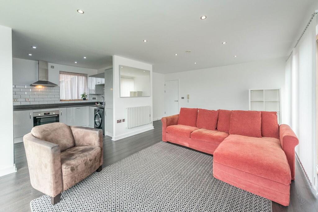 SITTING/DINING ROOM AND FITTED KITCHEN