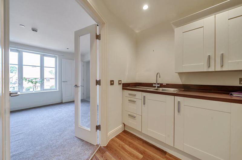 Living/dining room through to kitchen