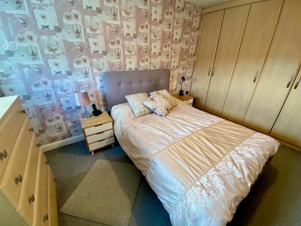 bed 1 showing robes.jpg