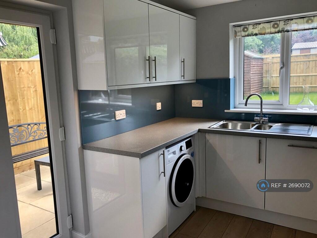 And Washer-Drier Machine And Glass Patio Door 