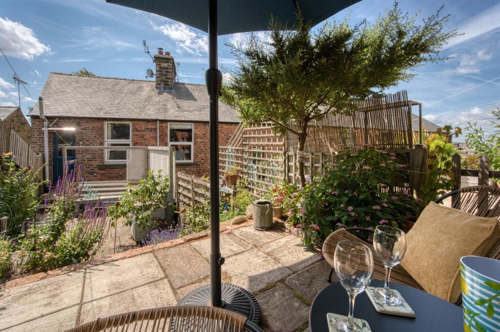 Patio dining to rear of the home.jpg