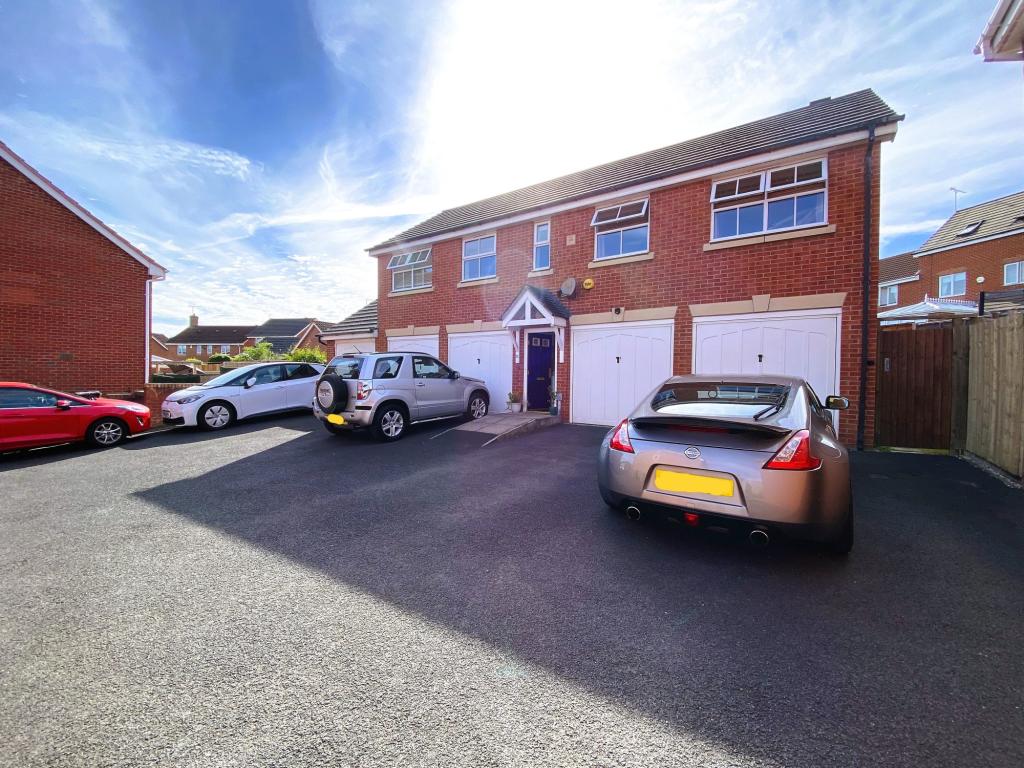 Garage on right of front door