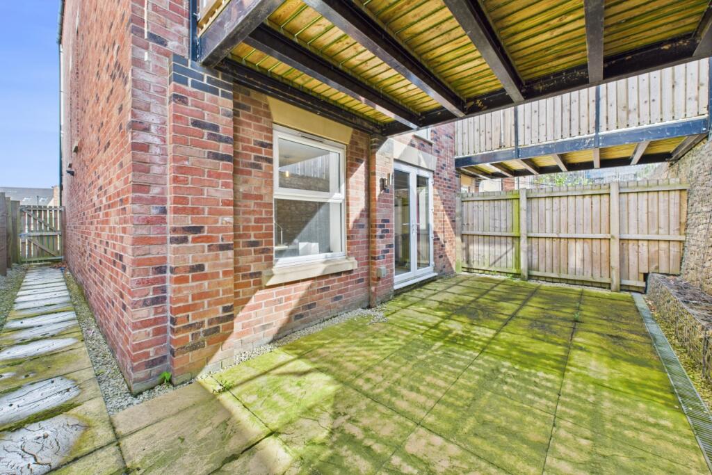 Rear ground level Patio
