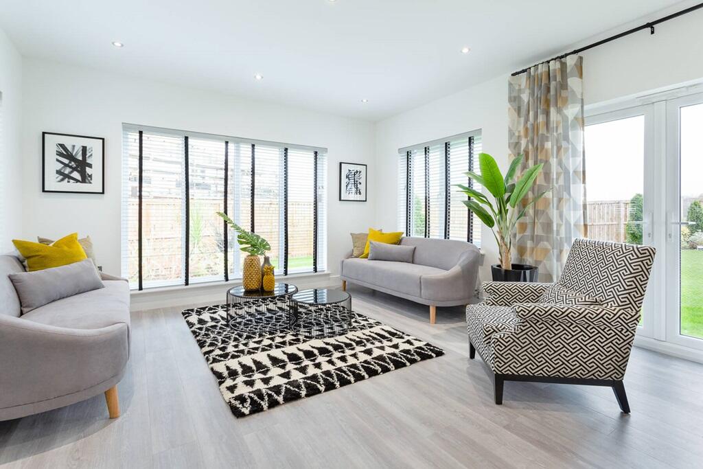 The bright garden room offers a superb social space