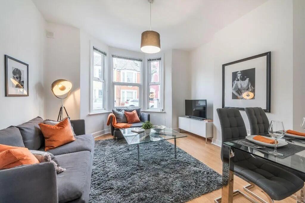 A stylish and inviting living room featuring a ...