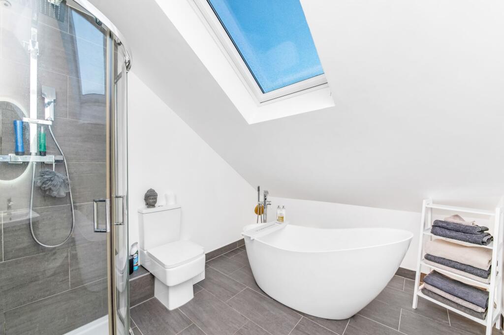 BEDROOM ONE EN-SUITE BATHROOM