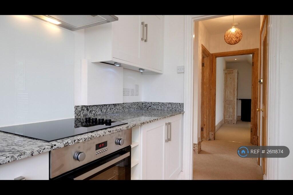 Kitchen And Hallway