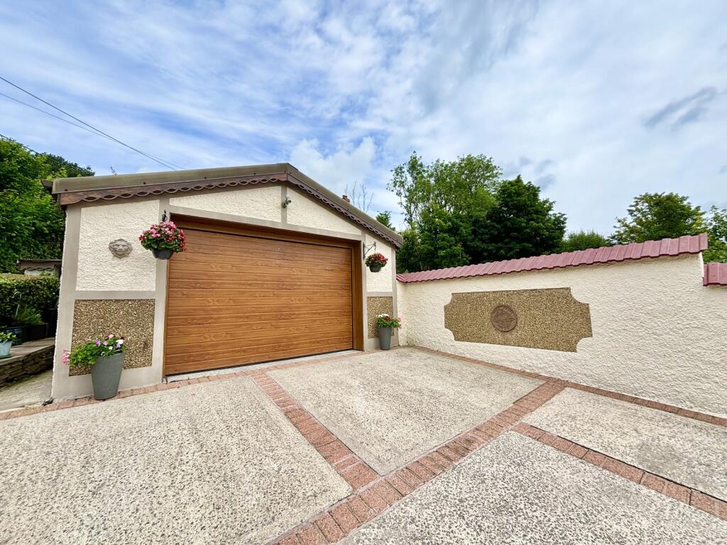 Driveway and detached garage 