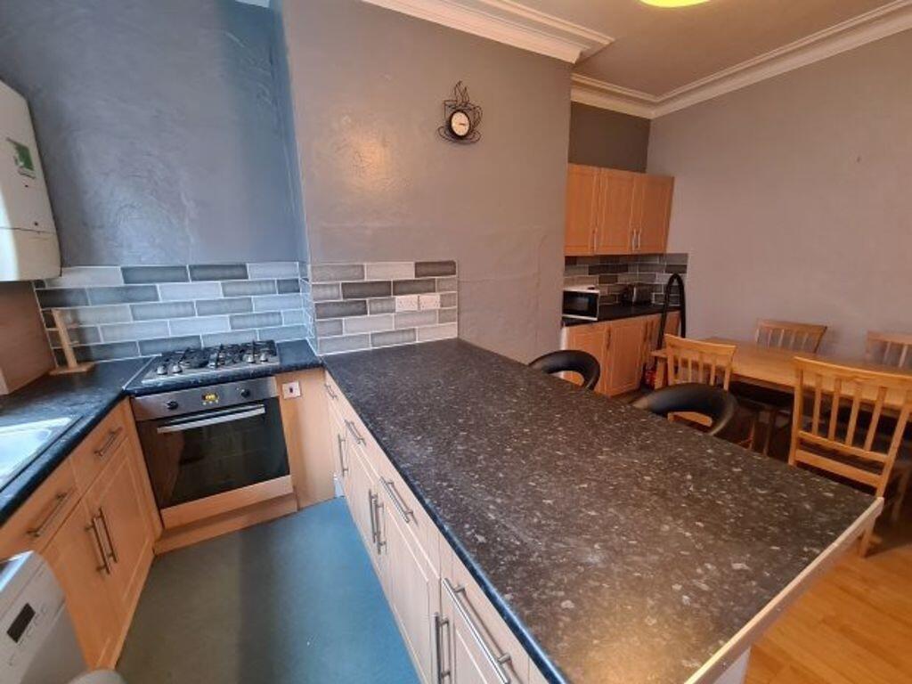 Bright and functional kitchen featuring a spaci...