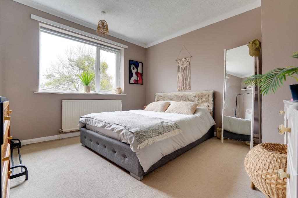 Bedroom 4 with garden views