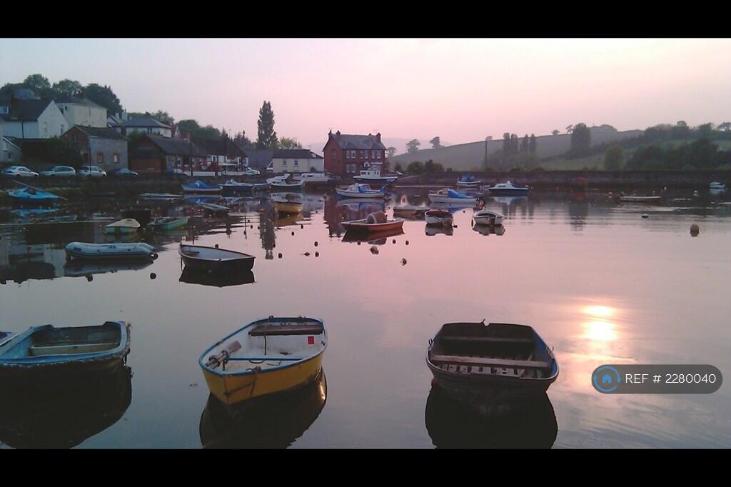 Evening Scene At Village Harbour