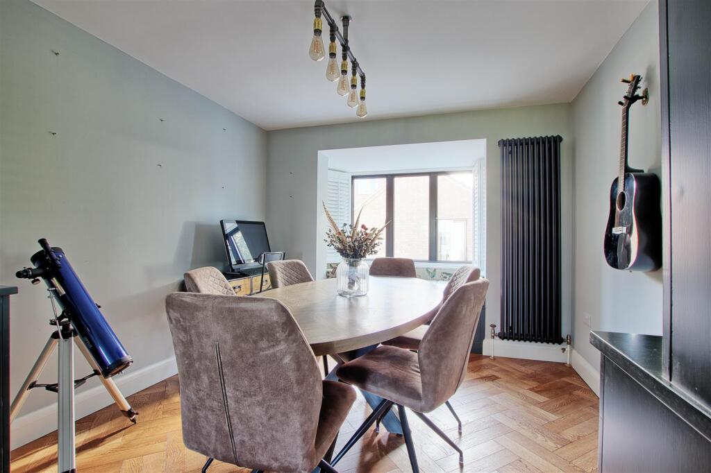 Dining room with sutters open.jpg