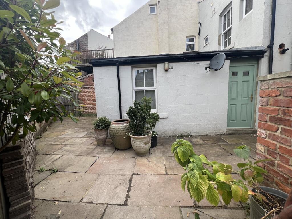 Rear Paved Garden Area