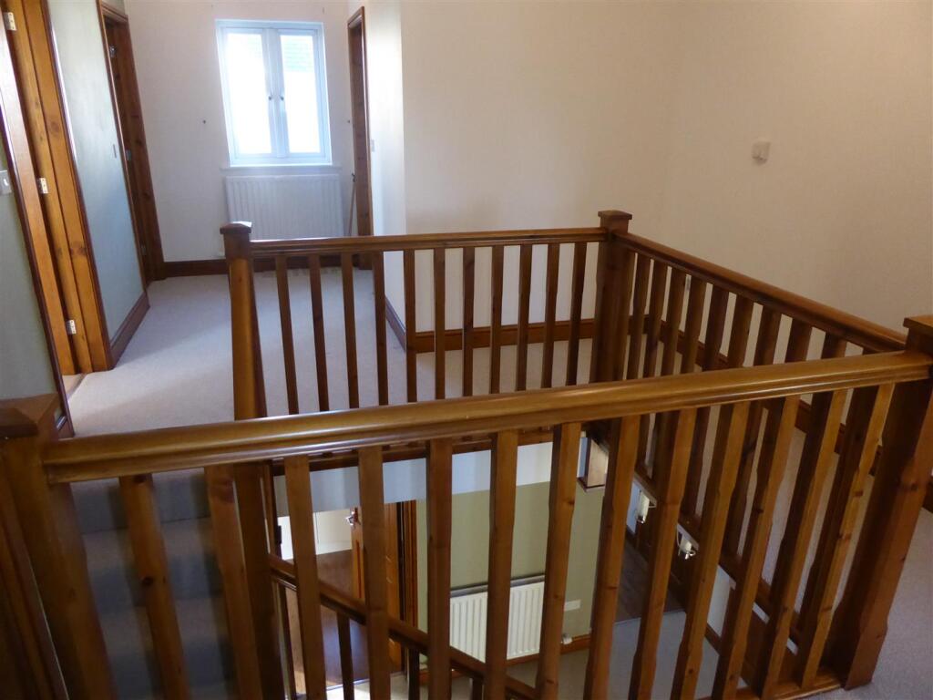 FIRST FLOOR LANDING